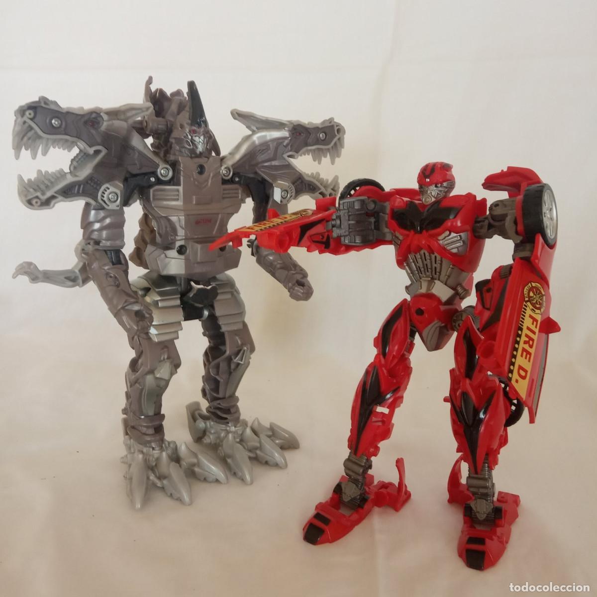Figuras y mu&ntilde;ecos Transformers: 2 Transformers: Grimlock (21 cm.) y Fire Rescue Car (17 cm.) - Foto 1