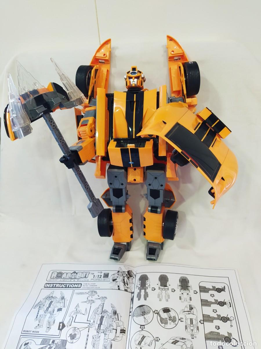 Figuras y mu&ntilde;ecos Transformers: ROADBOT FORD GT 1:12 CON MANUAL - Foto 2