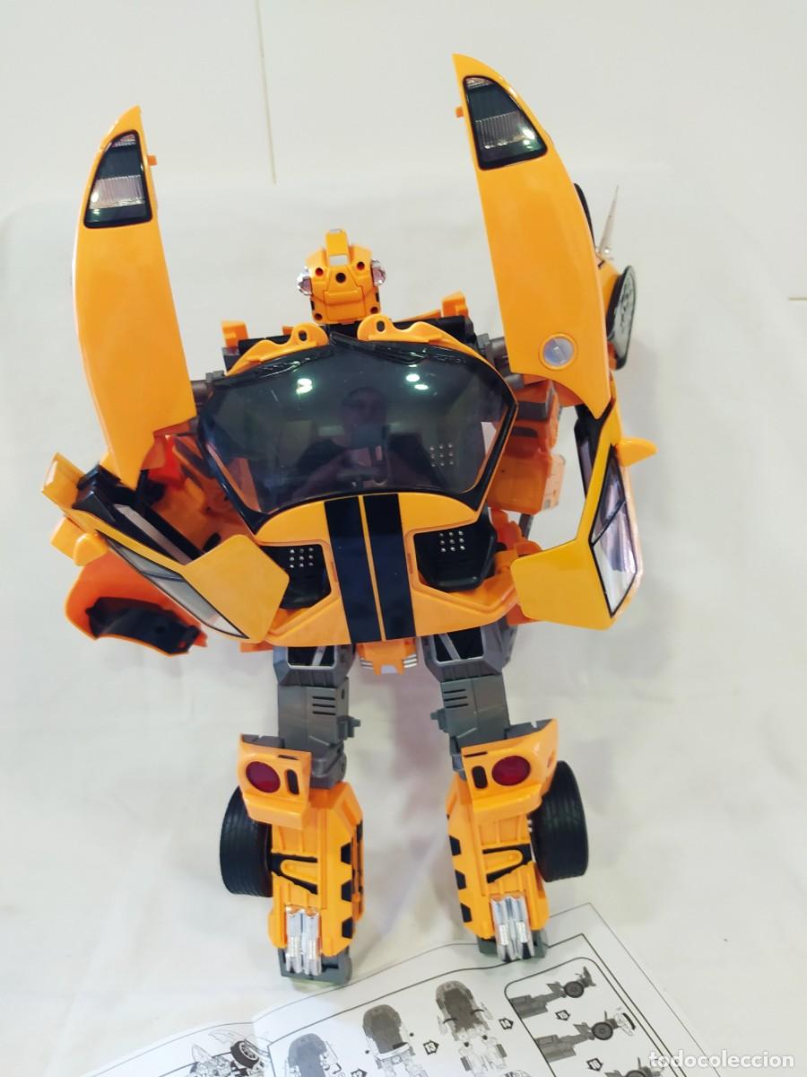 Figuras y mu&ntilde;ecos Transformers: ROADBOT FORD GT 1:12 CON MANUAL - Foto 4