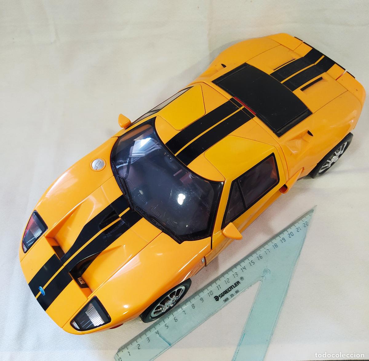 Figuras y mu&ntilde;ecos Transformers: ROADBOT FORD GT 1:12 CON MANUAL - Foto 1