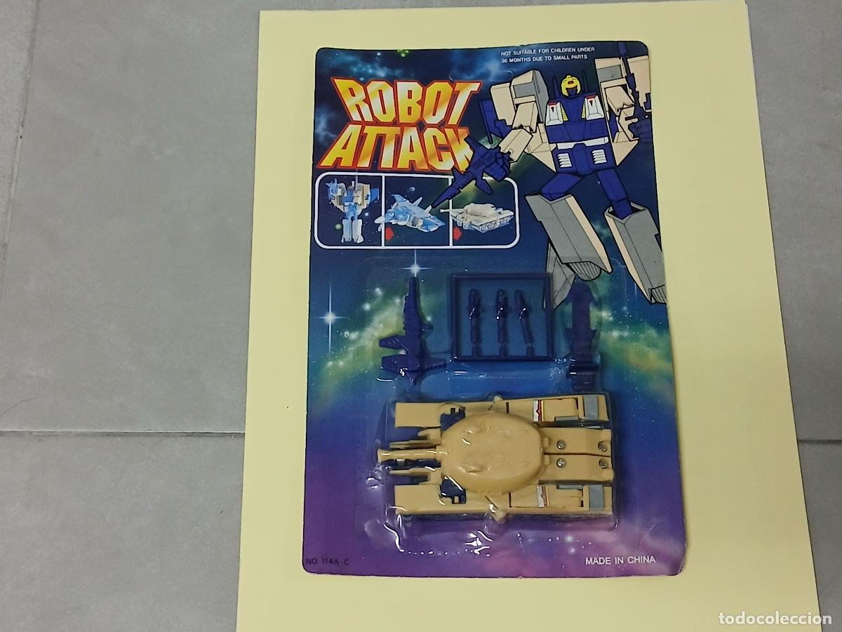 Figuren von Transformers: Juguete Transformer Transformers. Bootleg Robot attack, modelo tanque. En blister, a&ntilde;os 90
