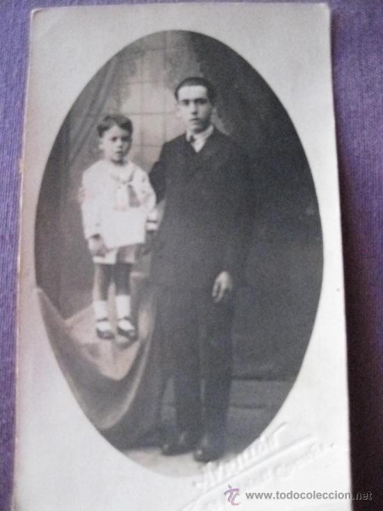 Fotografia antica: hombre con ni&ntilde;o