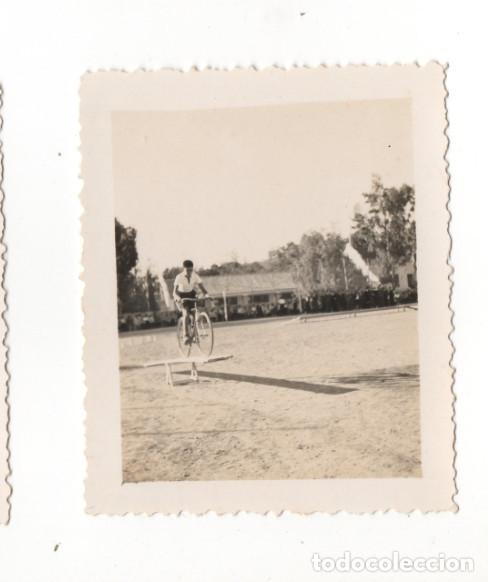 Fotograf&iacute;a antigua: CHICO ENTRENA CON BICICLETA EN COLEGIO DE MALAGA, FORMACION DEL ESPIRITU NACIONAL, CIRCA 1939, FOTO