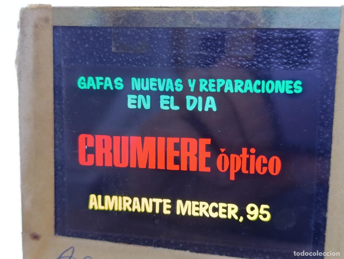 Fotografia antiga: Antiguo positivo en cristal, anuncio para cines, Gafas Grumiere &Oacute;ptico.