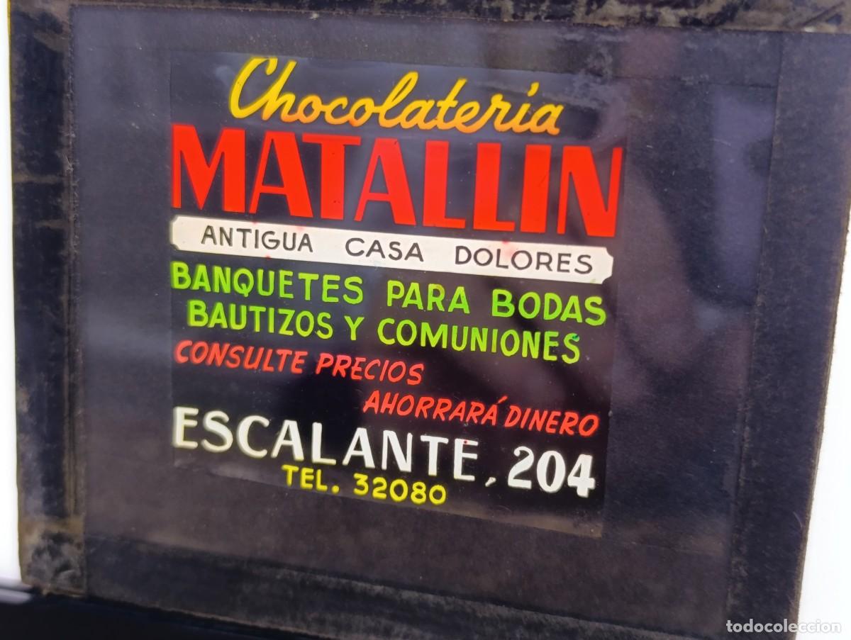 Fotografia antiga: Antiguo positivo en cristal, anuncio para cines, Chocolater&iacute;a Matall&iacute;n.