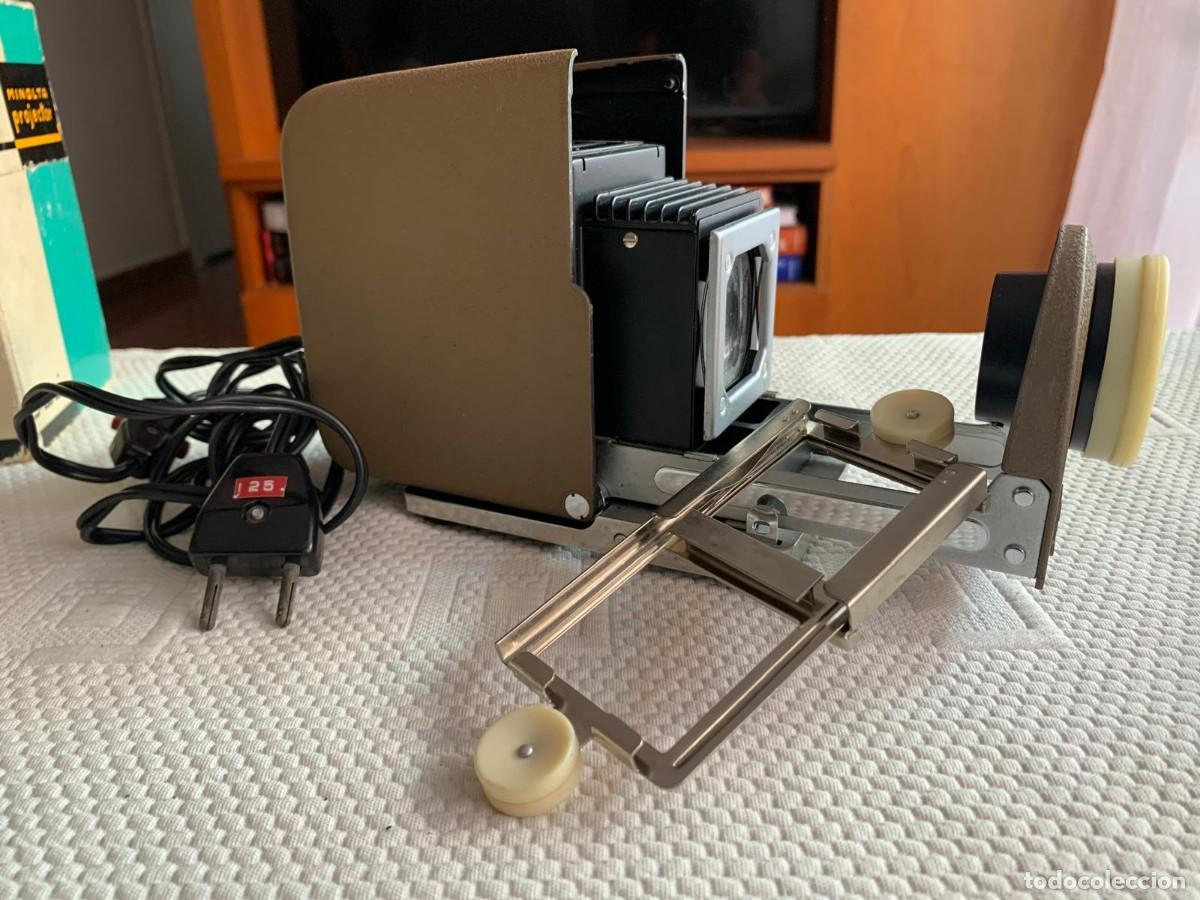 Fotograf&iacute;a antigua: Proyector de diapositivas Minolta Mini 35 Vintage Jap&oacute;n con caja y funda originales.