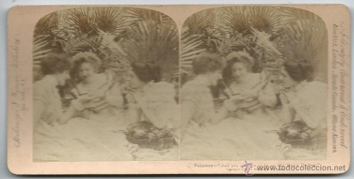 Fotografia antiga: vista estereoscopica  escena quiromancia