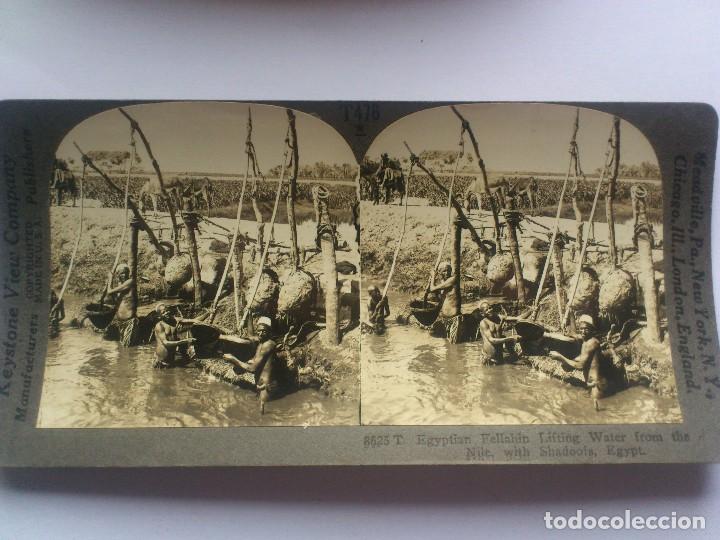 Fotografia antica: KEYSTONE VIEW COMPANY, FELLAHIN EGIPCIO, SACANDO AGUA DEL RIO NILO, EGIPTO, ORIGINAL, A&Ntilde;OS 20