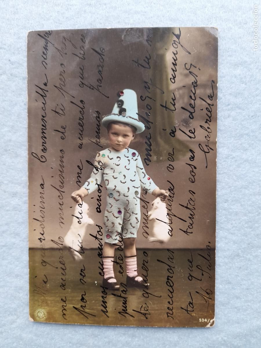 Fotograf&iacute;a antigua: Fotograf&iacute;a antigua de Ni&ntilde;o con Conejos. Escrita