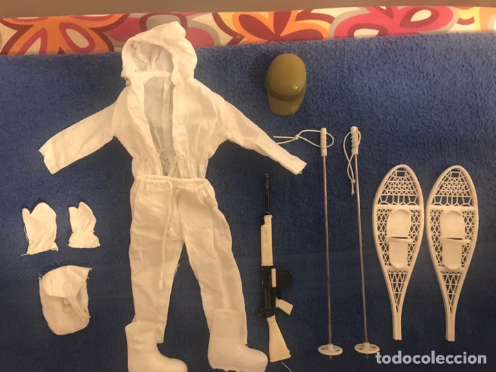 Geyperman: Uniforme del Monta&ntilde;ero Polar Artico con Palos y gorra y Raquetas.