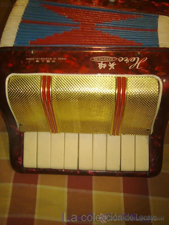 Instrumentos musicales: BONITO Y ANTIGUO ACORDEON MARCA HERO - Foto 2