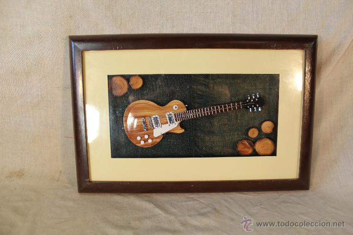 Instrumentos musicales: CUADRO VITRINA CON GUITARRA MINIATURA - Foto 1