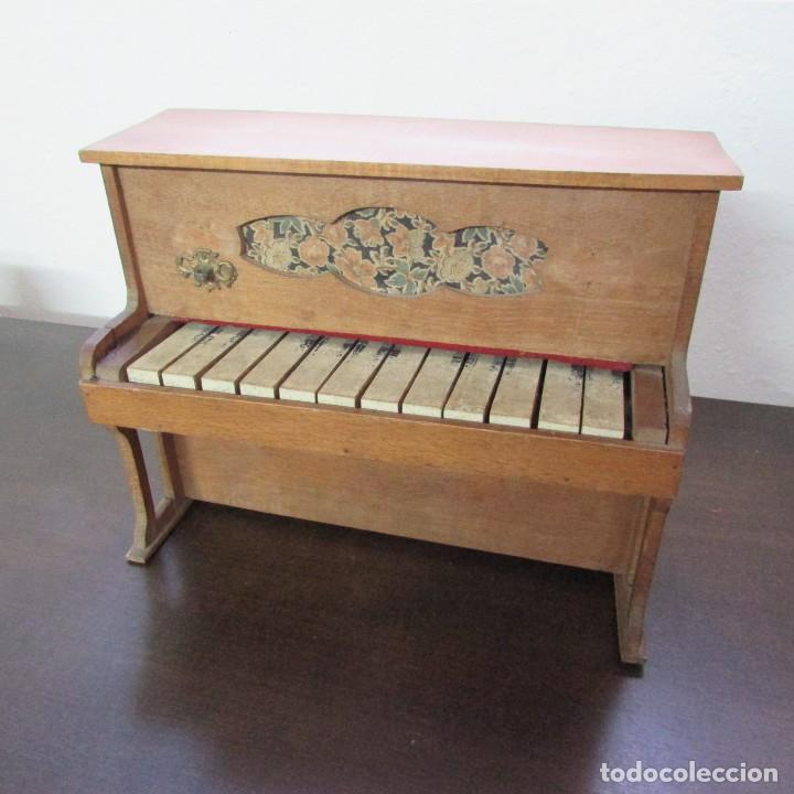 piano madera juguete