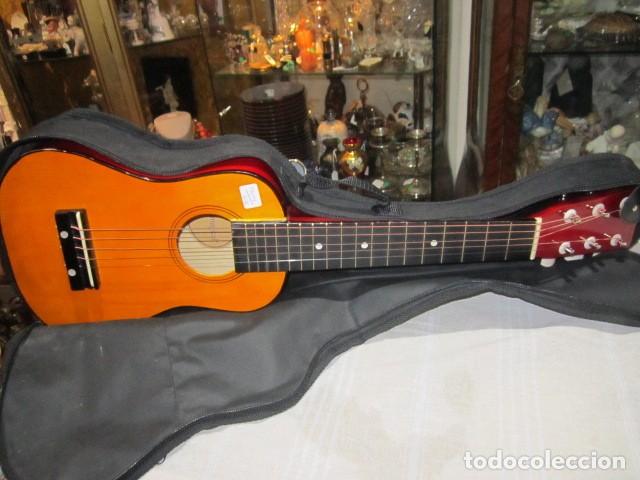 Guitarra Para Ninos Con Su Funda 64 Cms Larg Comprar