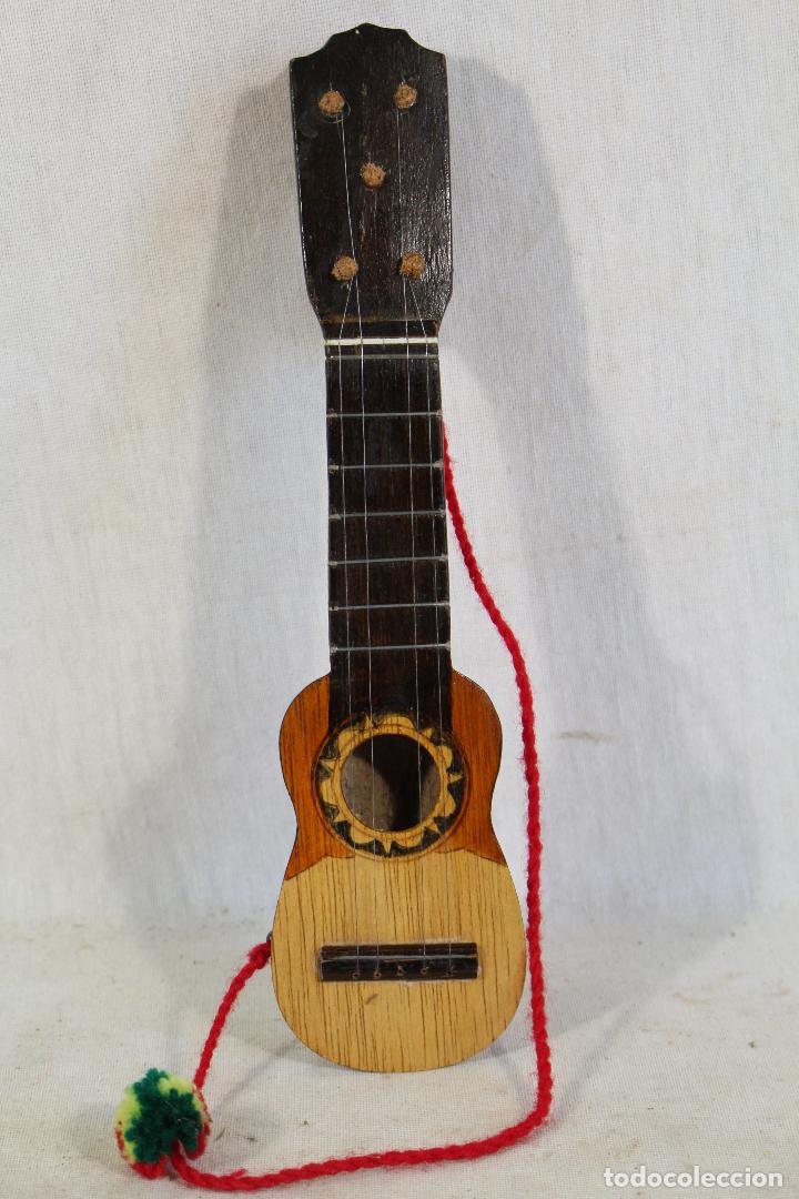 Guitarra pequeña y auténtica de 28 pulgadas, 6 cuerdas de Guilele de madera  clásica, 18 trastes, mini guitarra con tres UJ 513 de regalo|guitalele| -  AliExpress