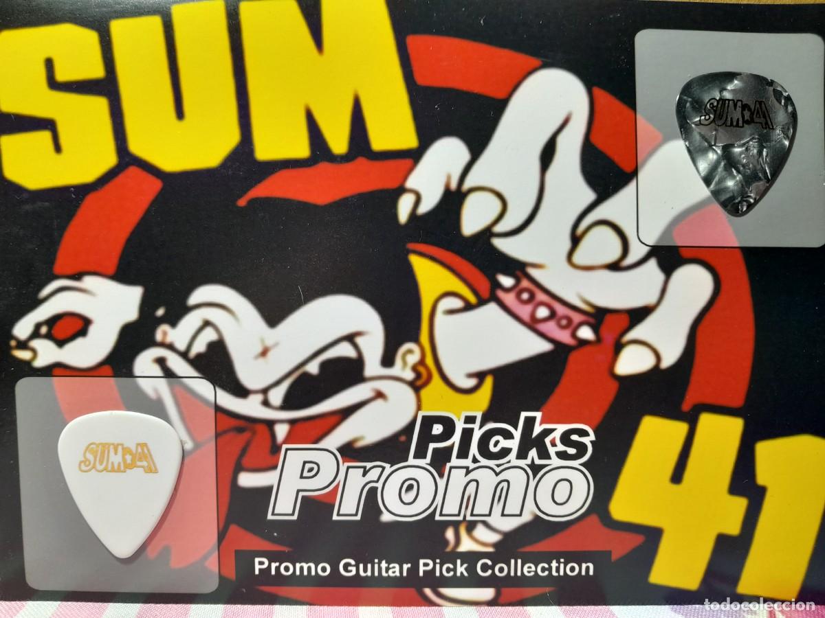 Instrumentos musicales: SUM 41. COLECCI&Oacute;N DE 2 P&Uacute;AS DE GUITARRA. - Foto 1