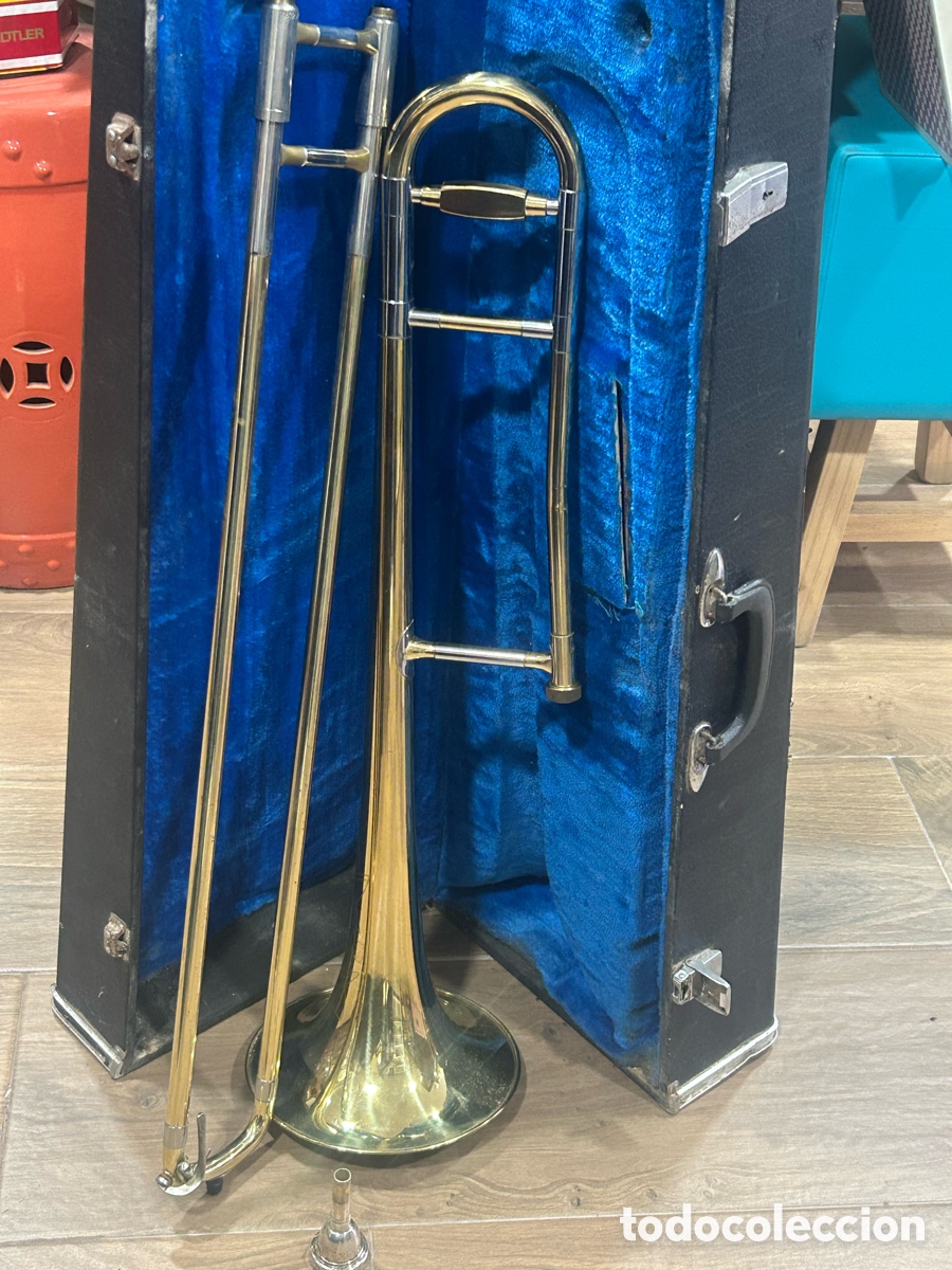Instrumentos musicales: Antiguo tromb&oacute;n marca SWALLOW