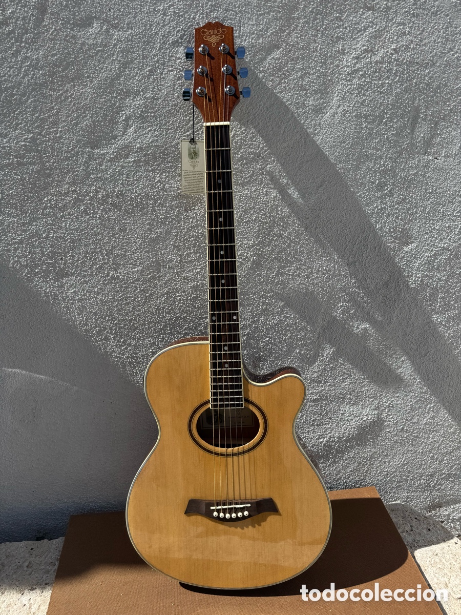 Instrumentos musicales: Guitarra electroac&uacute;stica Garrido acabado natural dise&ntilde;o cutaway modelo fusi&oacute;n CE NT 100cms nueva
