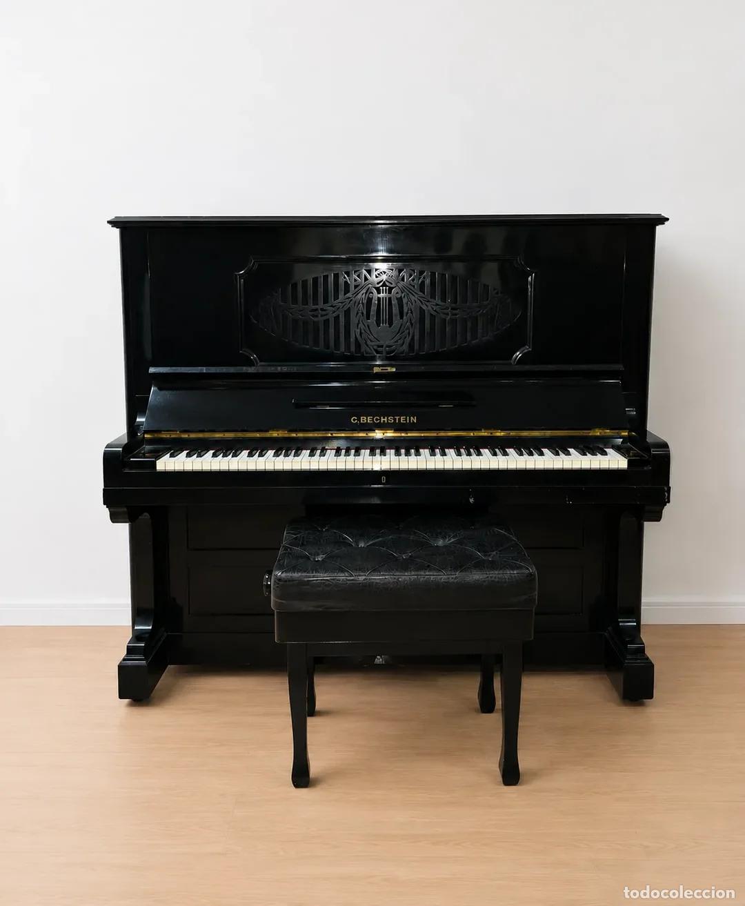 Instrumentos musicales: Piano Vertical C. Bechstein Berl&iacute;n &eacute;bano con banqueta