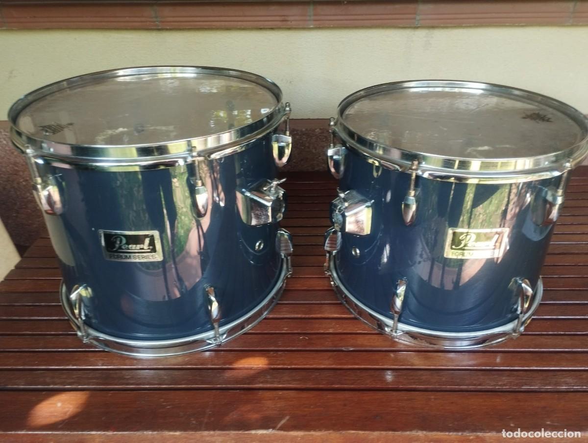 Musikinstrumente: Toms a&eacute;reos (timbales) de la reconocida marca Pearl, pertenecientes a la serie Forum.