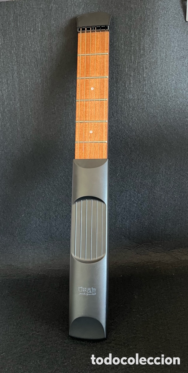 Musical instruments: Guitarra de bolsillo de entrenamiento