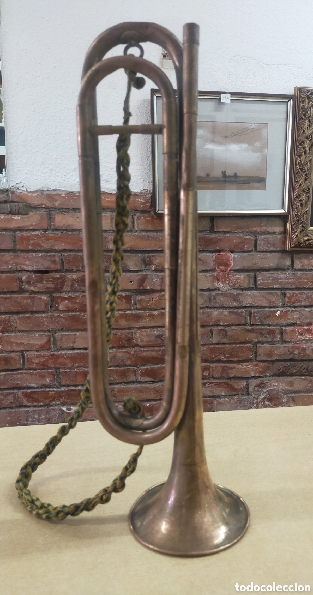 Instrumentos musicales: Corneta de lat&oacute;n con bord&oacute;n