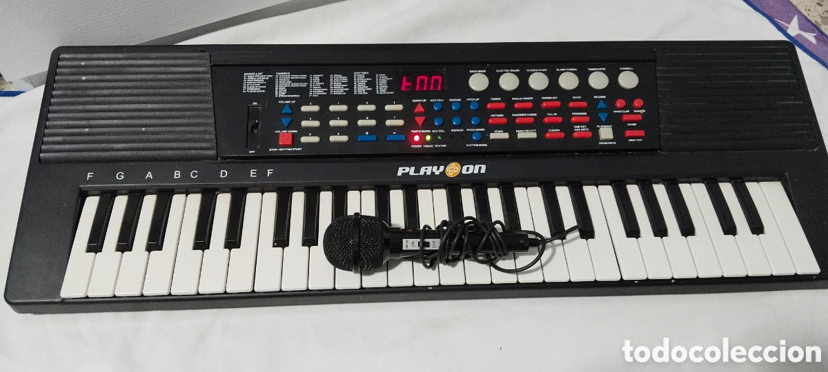 Instrumentos musicales: Teclado electr&oacute;nico Play On FW8148 de 61 teclas con micr&oacute;fono y cargador
