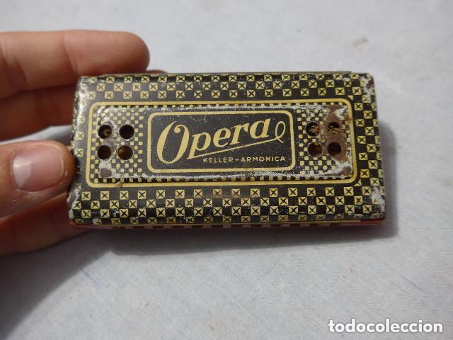 Instrumentos musicales: Antigua armonica keller opera, original de hojalata, tipo juguete ? Principios siglo XX.