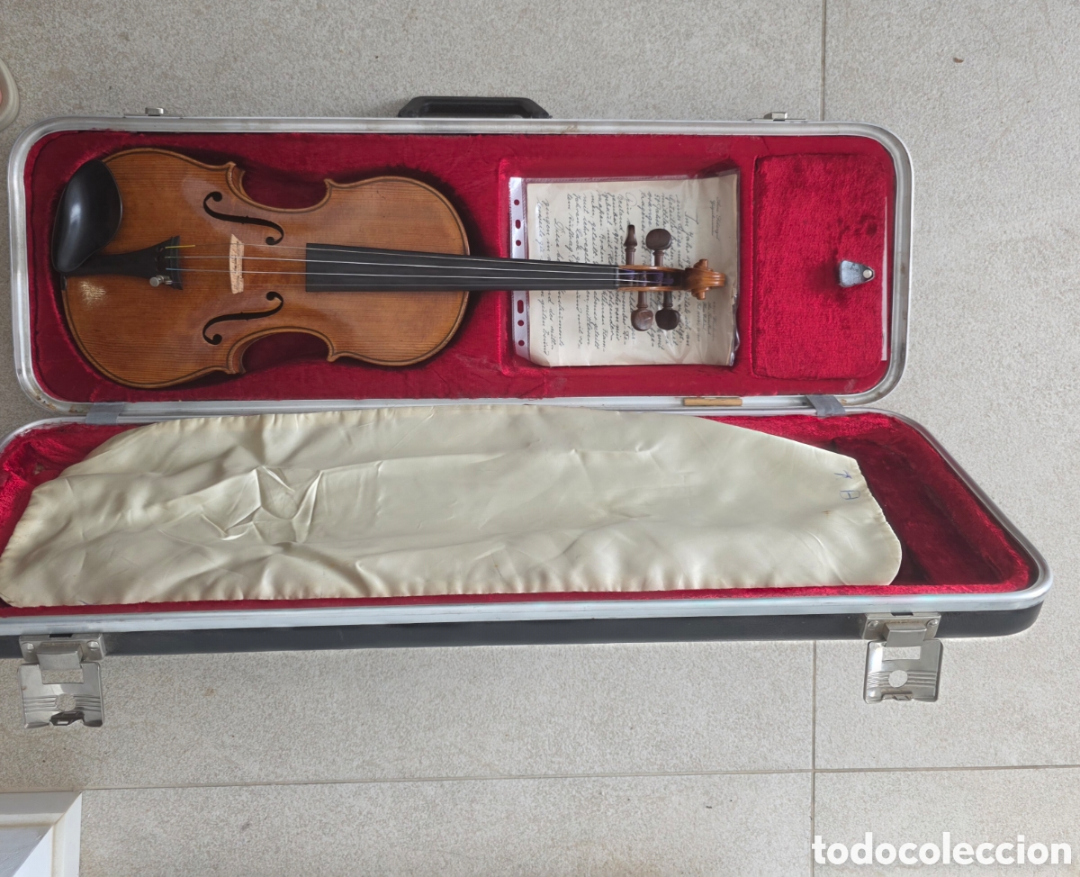 Instrumentos musicales: Violin con funda y partituras