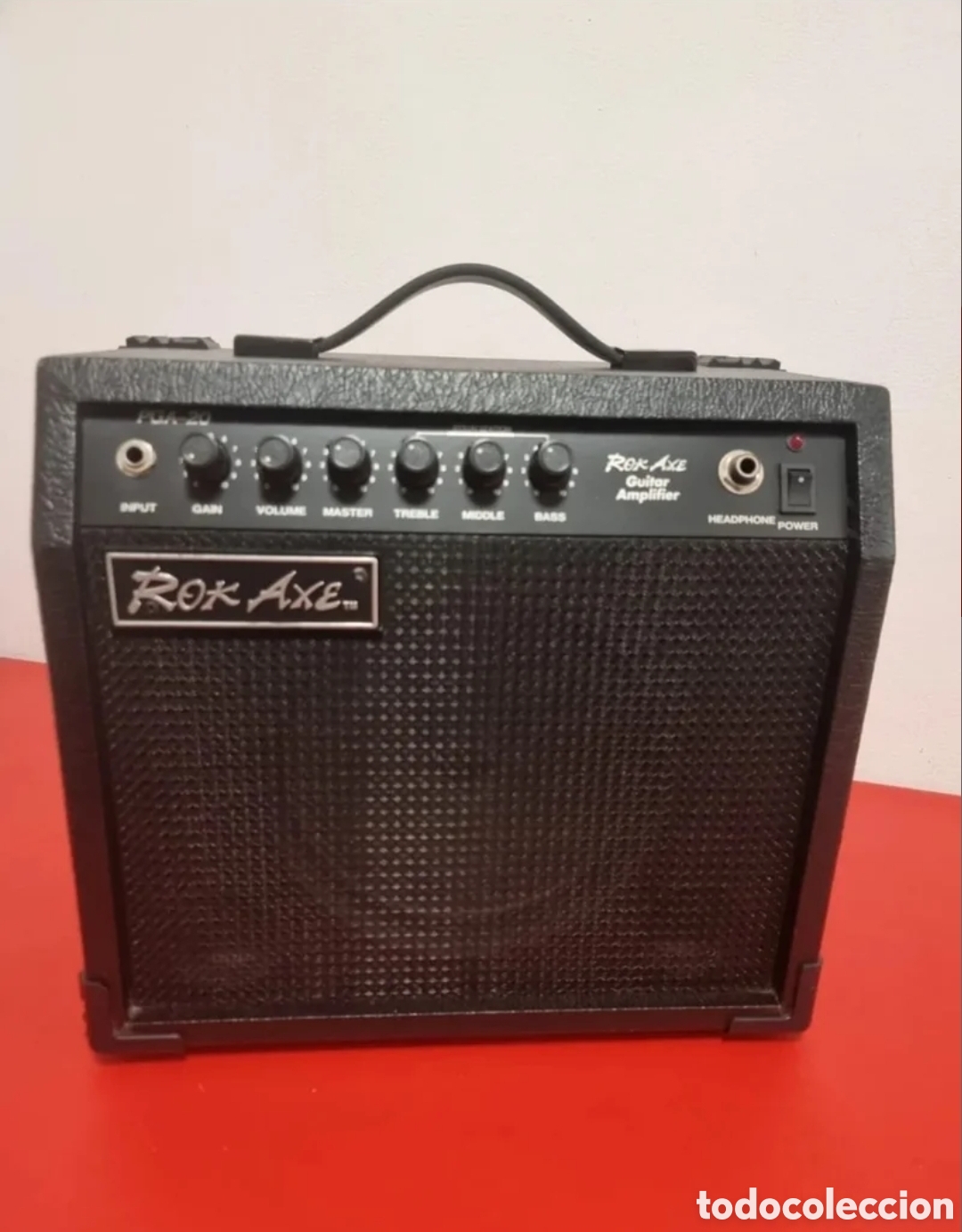 Instrumentos musicales: Amplificador para guitarra. ROCK AXE