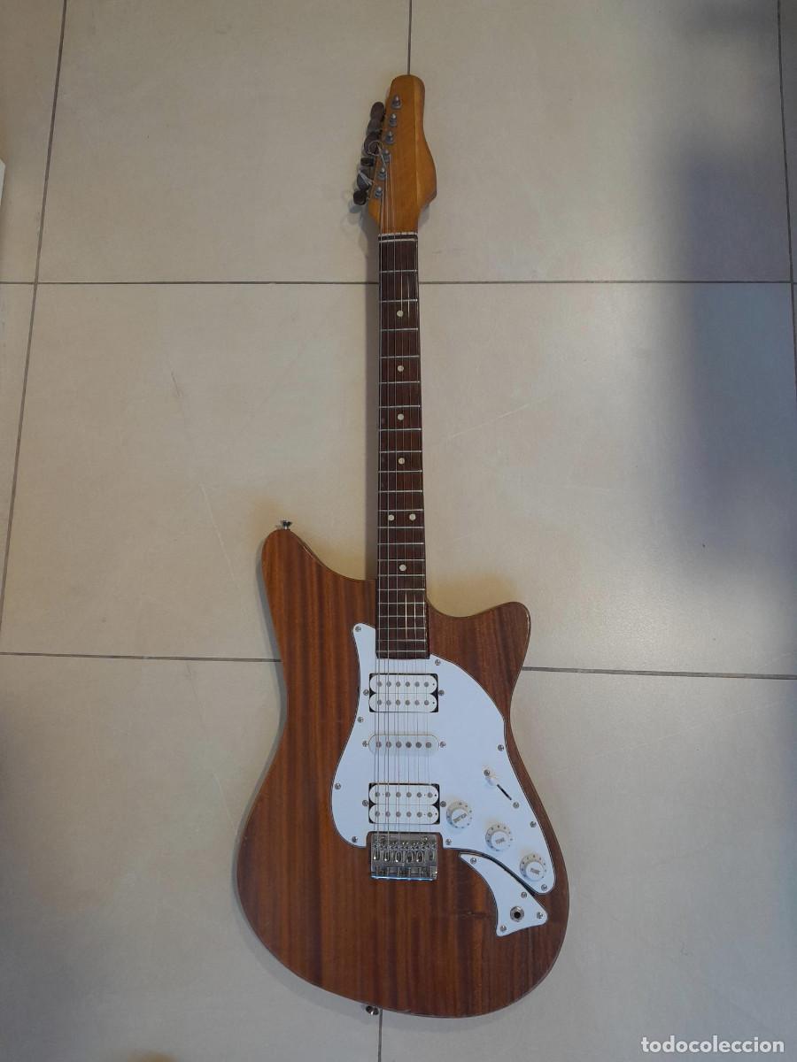 Instrumentos musicales: Guitarra electrica JOMADI, + pastillas originales