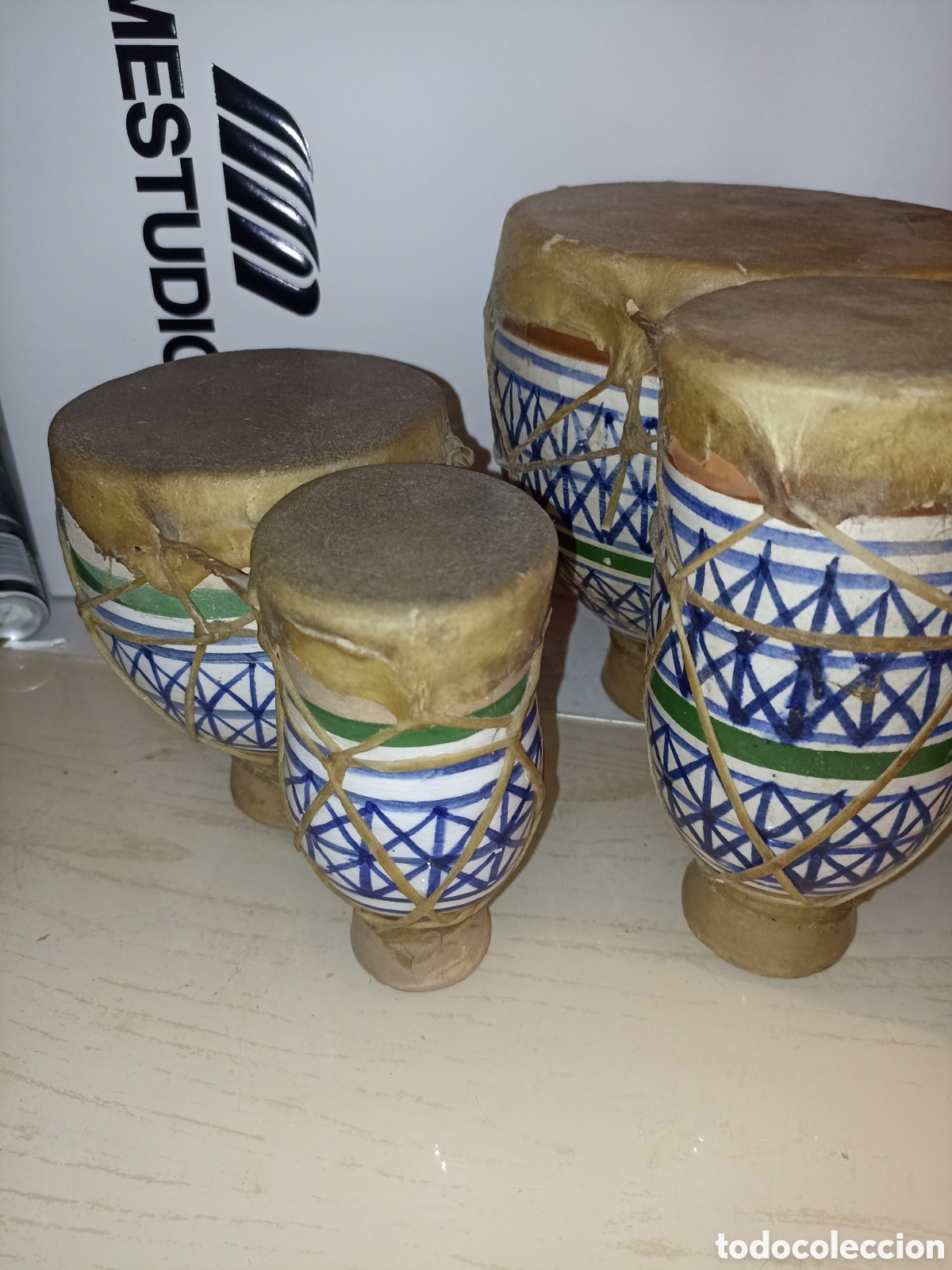Instrumentos musicales: Conjunto de dos instrumentos musicales dobles (4 piezas en total, unidas por parejas) elaborados de