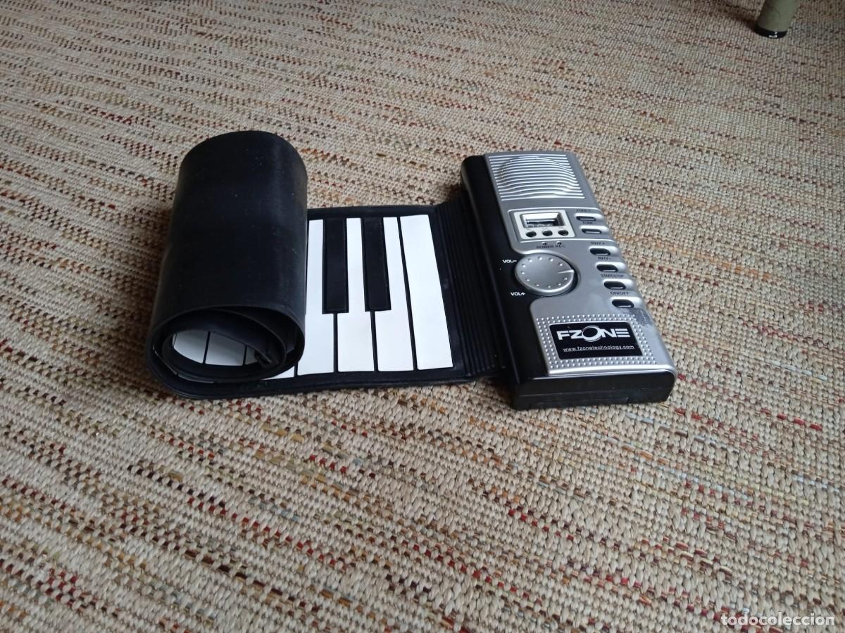 Instrumentos musicales: Piano/teclado enrollable FZONE de 49 teclas