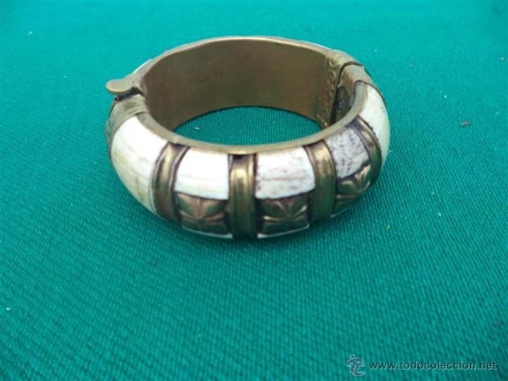 Joyeria: brazalete de hueso y metal - Foto 1