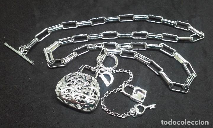 Joyeria: COLGANTE BOLSO EN PLATA - Foto 4