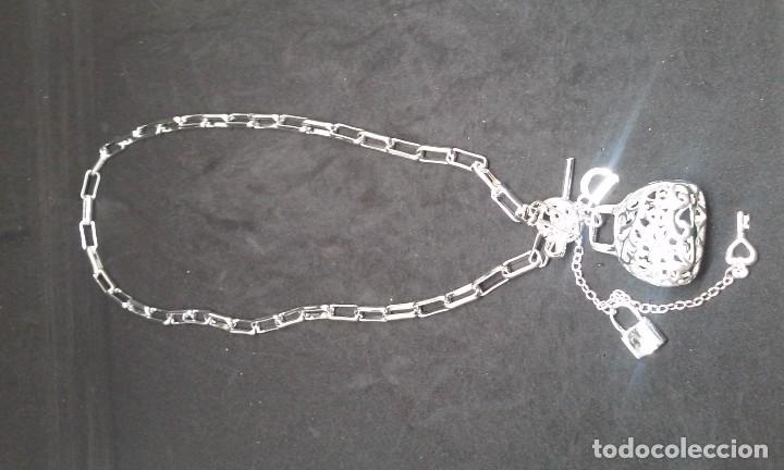 Joyeria: COLGANTE BOLSO EN PLATA - Foto 5
