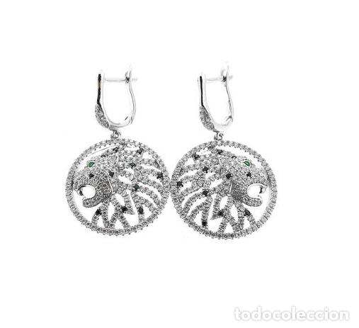 Joaillerie: Pendientes cabezas de leones.