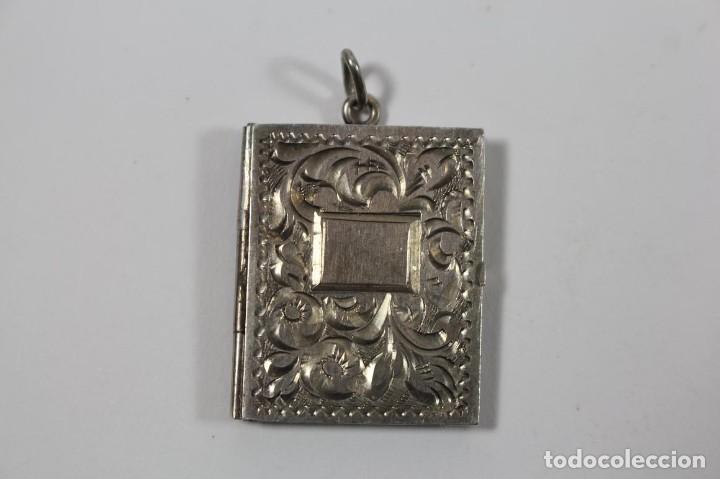 Joyeria: Colgante porta-retratos. 1920-1930