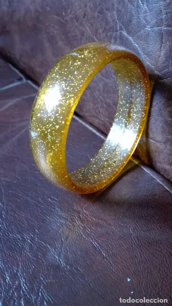Joyeria: Pulsera de color con chispitas doradas transparente. - Foto 1