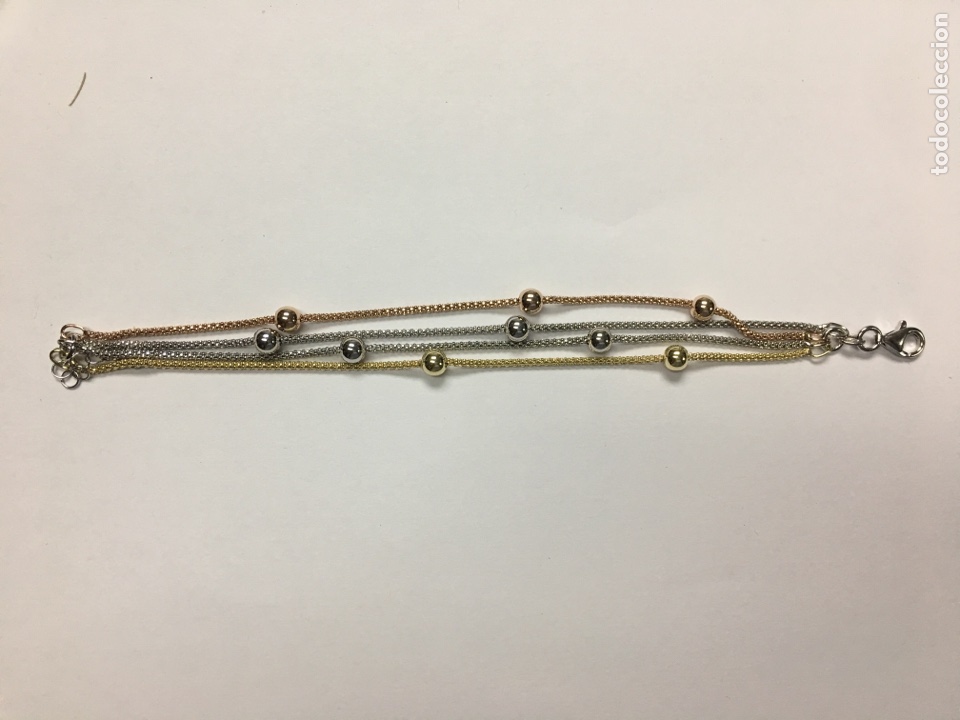Jewelry: Pulsera de plata tricolor