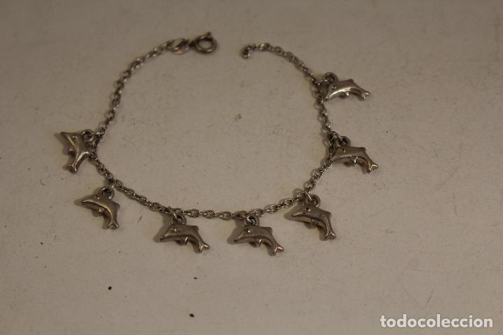 Joyeria: pulsera con delfines en plata de ley - Foto 1