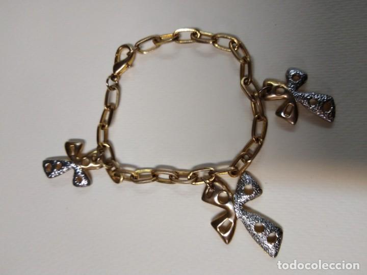 Joyeria: Pulsera dorada con tres cruces - Foto 1