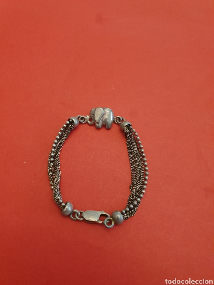 Joyeria: Pulsera de plata.Lleva un elefante en el medio. - Foto 1
