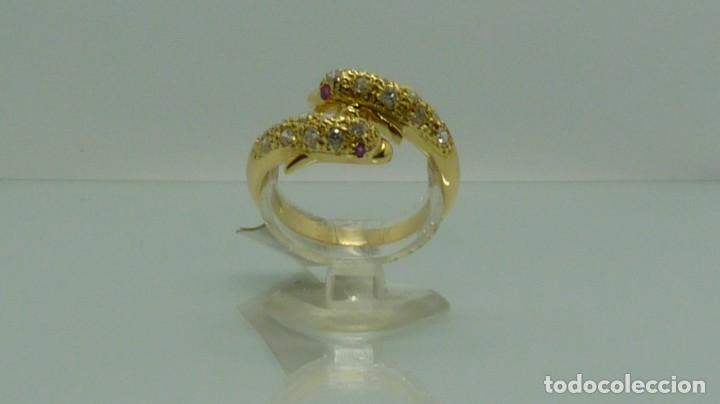 Joyeria: ANILLO DELF&Iacute;N CON CIRCONITAS Y RUBIES EN ORO DE 750MM. - Foto 1
