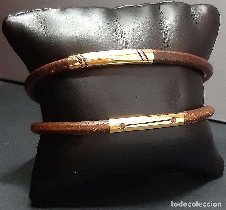 Joyeria: Brazaletes oro 18 K y cuero (750/000) - Foto 1