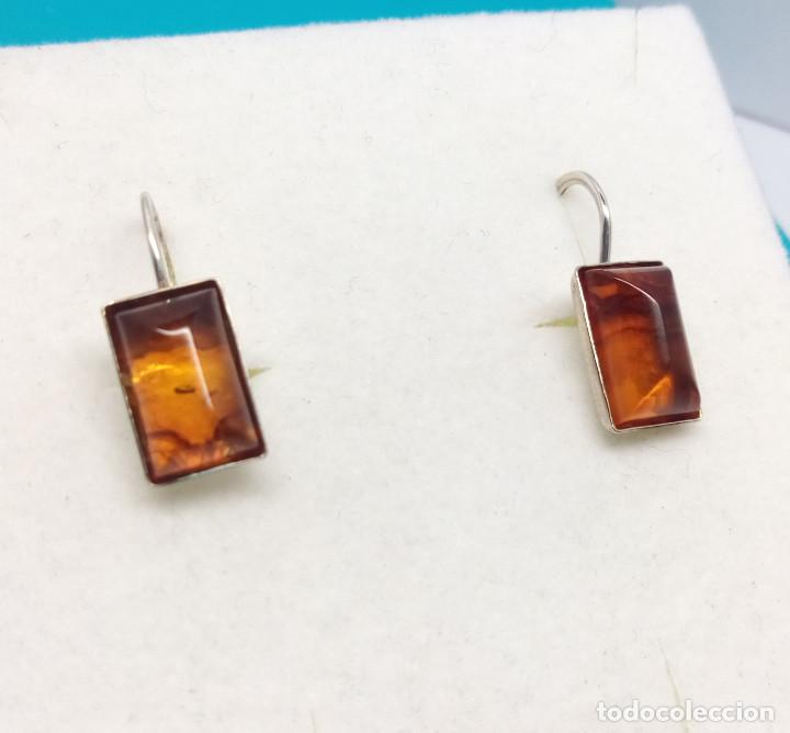 Joyeria: PENDIENTES DE PLATA DE LEY CON S&Iacute;MIL DE &Aacute;MBAR - MEDIDA 2 cm.