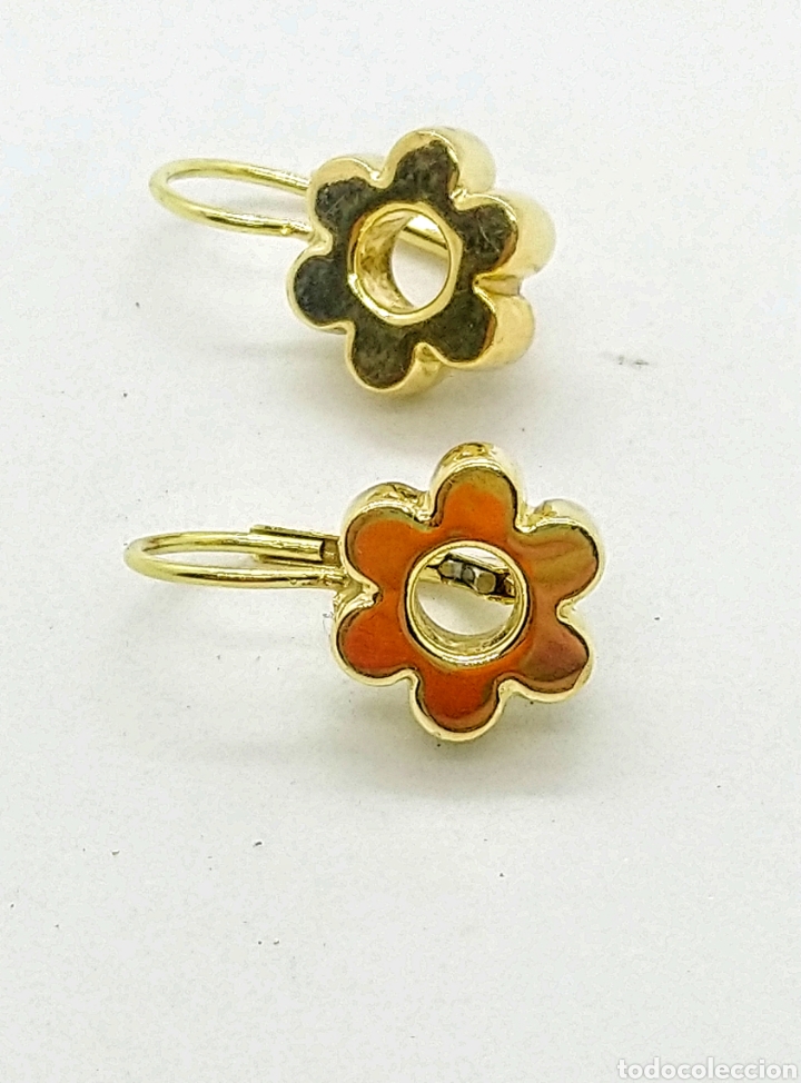 Joyeria: Pendientes flor en oro 18 kts. 3,75grms.