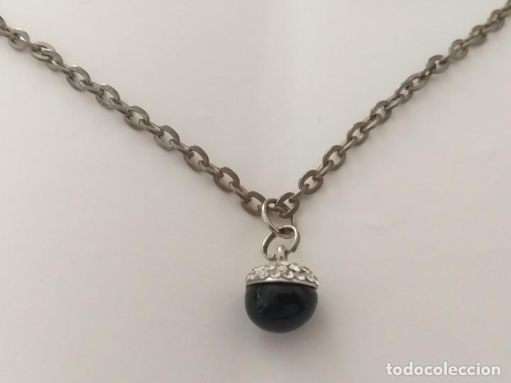 Joyeria: Cadena plateada con colgante. 66 cm de largo - Foto 4