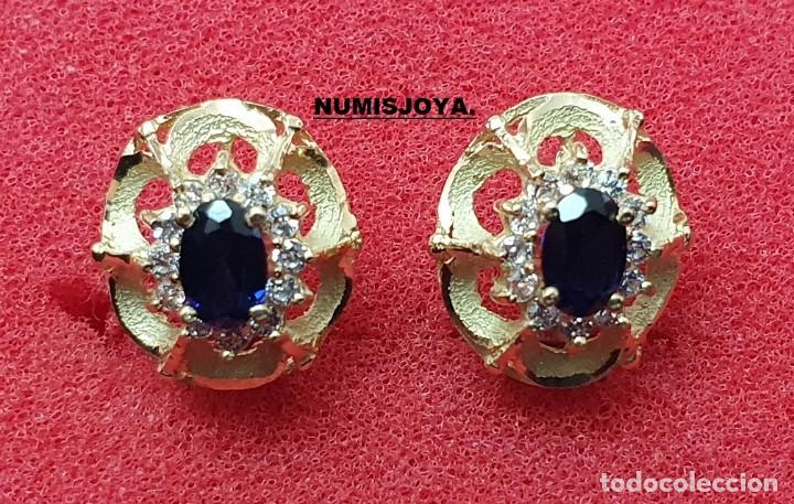 Joyeria: Pendientes de Oro 18 quilates con piedras azules y circonitas. Peso 4,00 gr. 15 x 12,50 mm.
