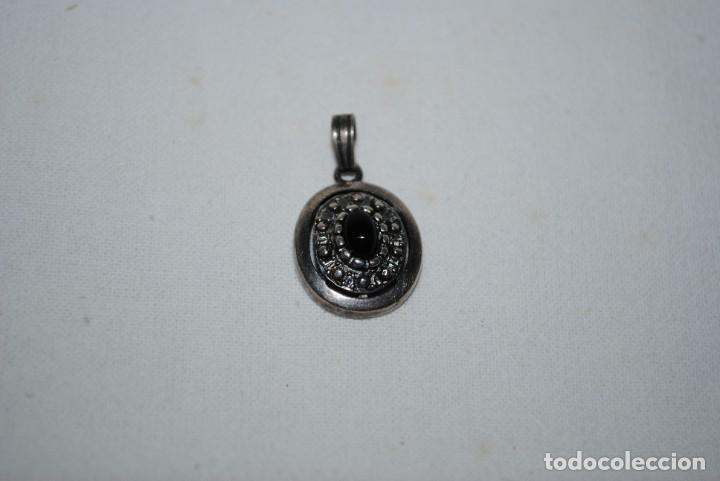 Joyeria: COLGANTE DE PLATA CON PIEDRA NEGRA . - Foto 1